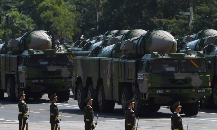 Military vehicles carrying DF-21D missiles are displayed in a military parade at Tiananmen Square in Beijing on Sept. 3, 2015.