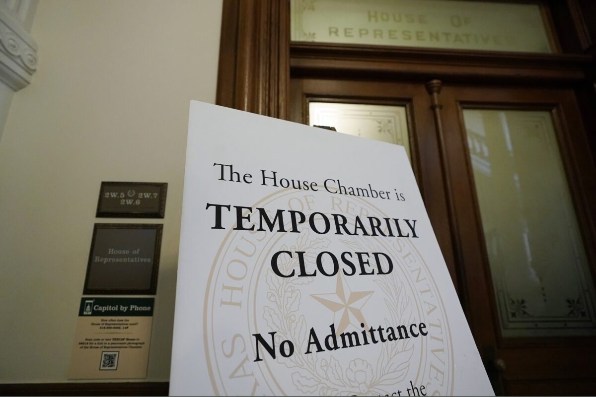 A sign shows the Texas House Chamber closed at the Texas Capitol in Austin, Texas, on Aug. 11, 2021.